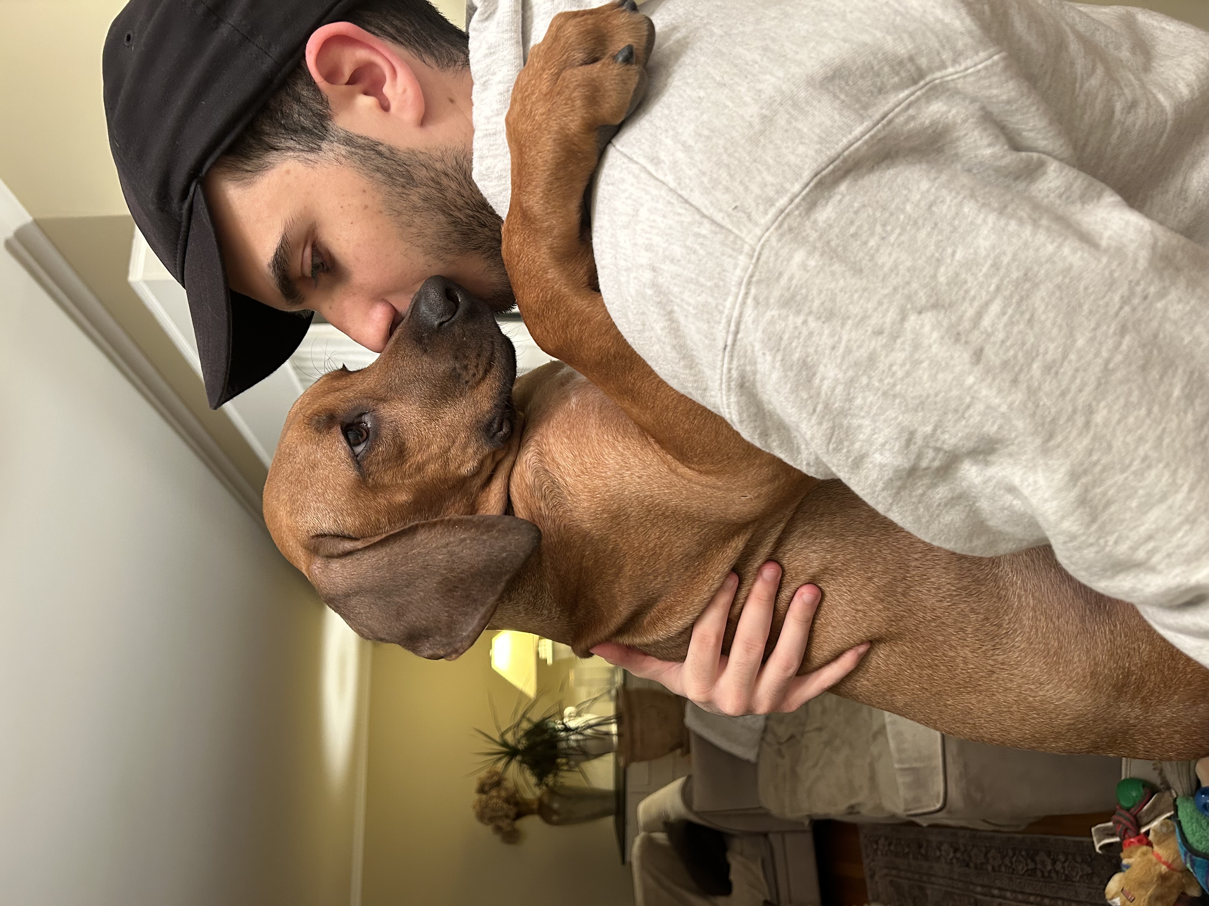 Holding Ravi as a puppy